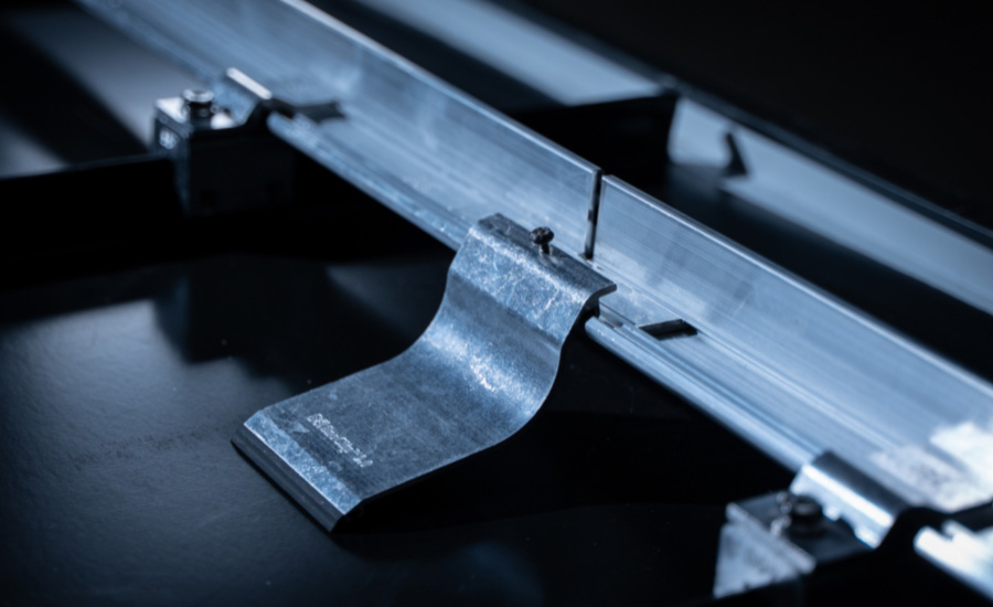 Safeguard Your Building: How Snow Guards Prevent Costly Roof & Property Damage